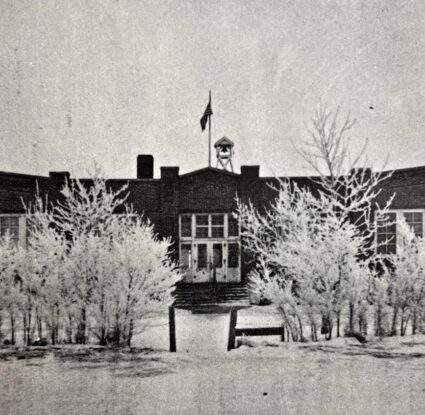 Turner Public School as it stood in the mid-1940s. While the bell no longer sits atop the school, it now resides in the cafeteria, preserving a piece of our history for all to see.