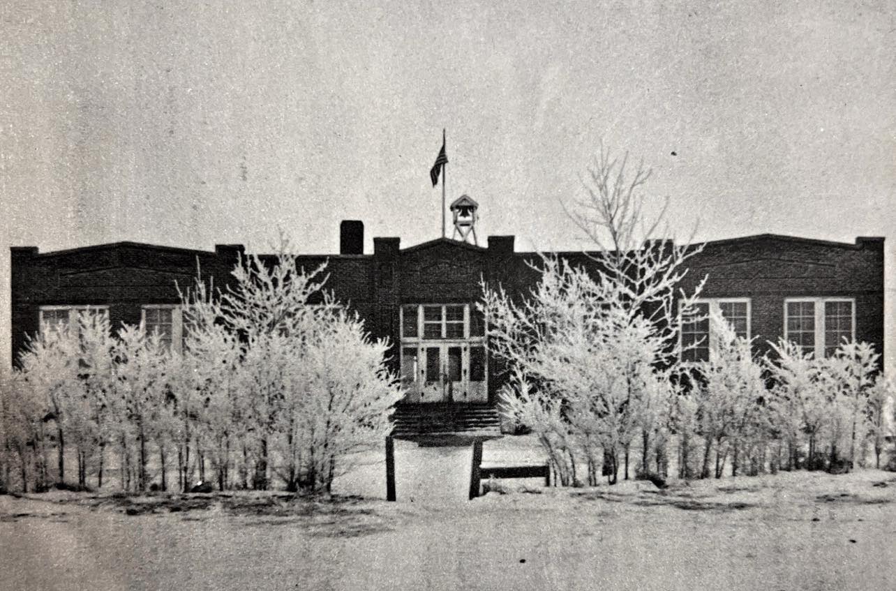 Turner Public School as it stood in the mid-1940s. While the bell no longer sits atop the school, it now resides in the cafeteria, preserving a piece of our history for all to see.