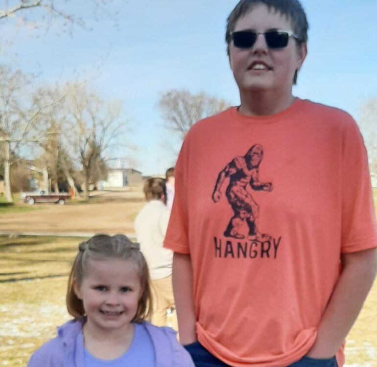 T-Mates, Evie and Avery, posing after the Easter egg hunt before Easter Break.