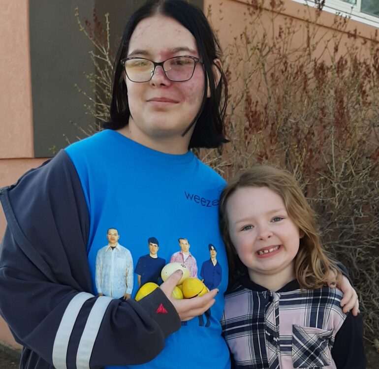 T-Mates, Juliann and Ellie, posing after the Easter egg hunt before Easter Break.